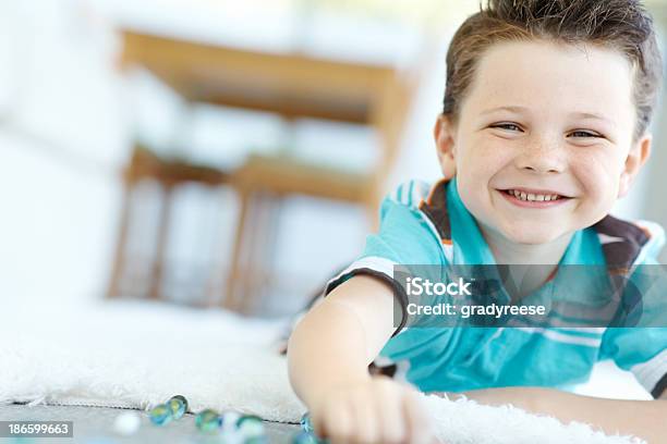 Having Fun With Marbles Stock Photo - Download Image Now - 6-7 Years, Activity, Boys