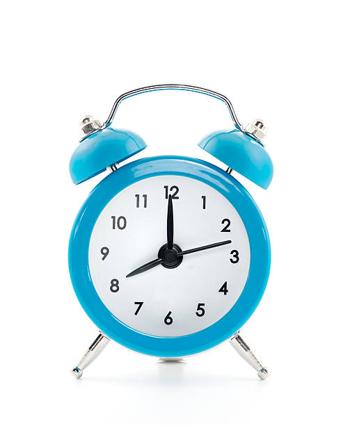 istock Blue old style alarm clock isolated on white background 186603303