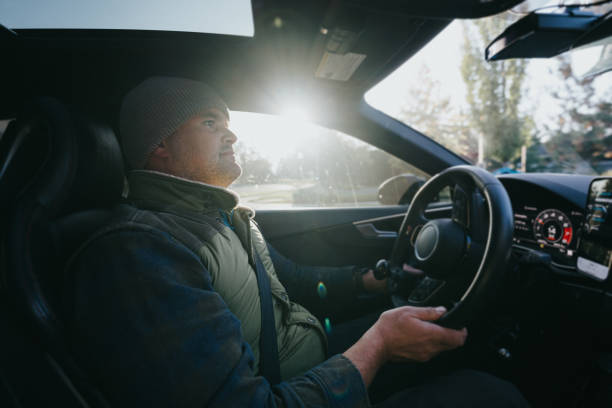istock Caucasian man with a disability driving his car 1866033300
