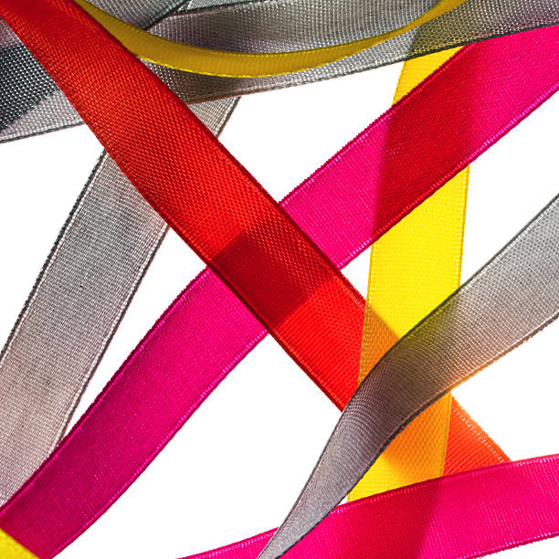 istock Red, yellow, orange, blue shiny gradient curling ribbons for design. 186603648
