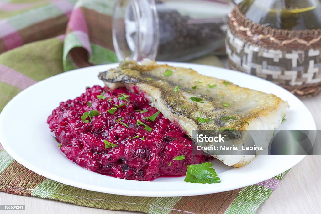 Fried fish fillet of perch with mashed beet and potato Fried fish fillet of perch with mashed beet and potato, elegant dinner Beet Stock Photo
