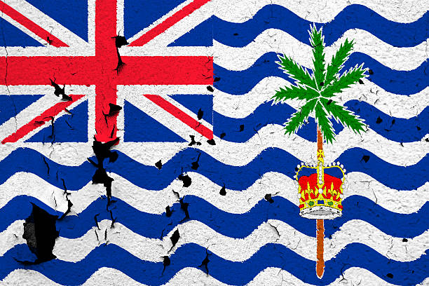 The flag of British Indian Ocean Territory painted on a cracked and peeling wall.
