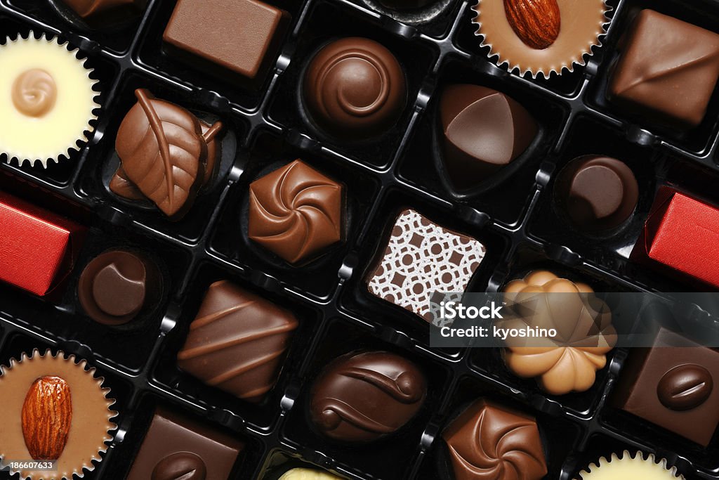 Close-up shot of many chocolates in box Close-up shot of many chocolates in box. Anniversary Stock Photo