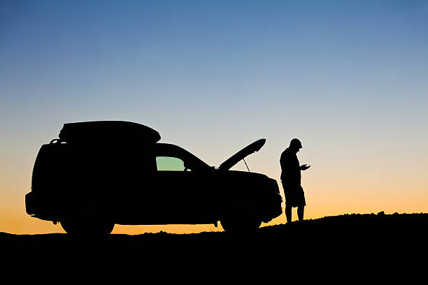 istock Calling For Help Beside Brokedown Vehicle 186608431
