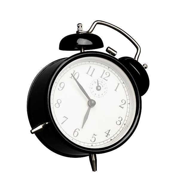 isolated black alarm clock stock photo