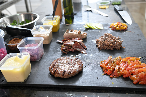 food preparation in kitchen, meat vegetables cook taste image