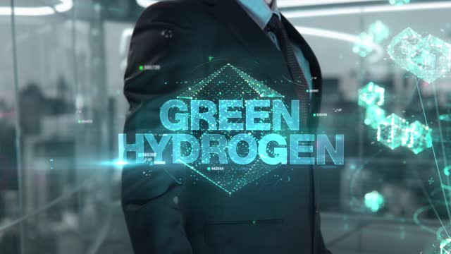 Green hydrogen- businessman working with virtual reality at office.