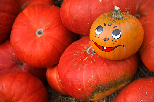istock Painted grimace on pumpkin for Halloween 186610146