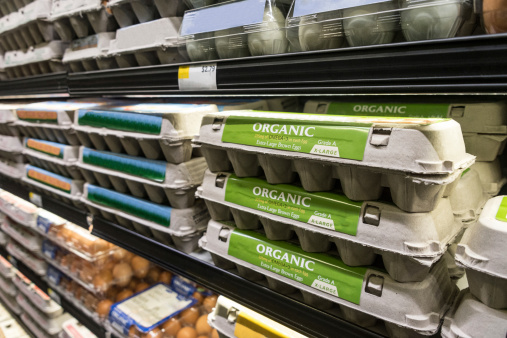 Organic eggs for sale in a supermarket shelves