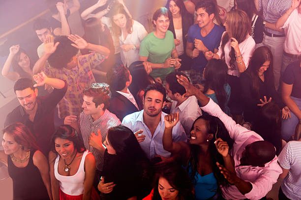 istock People dacing at a nightclub 186614421