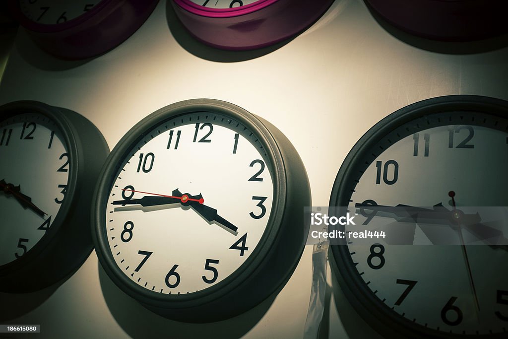 Group of alarm clocks 12 O'Clock Stock Photo