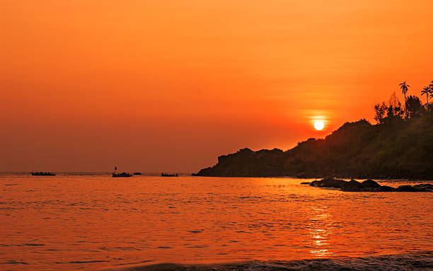 Sunset in Goa Stunning Sunset at beach in Goa, India palolem beach stock pictures, royalty-free photos & images