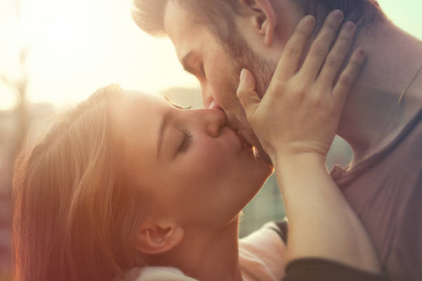 istock kissing couple 186616737