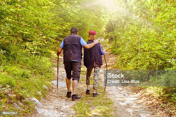 Senior Couple Hiking Stock Photo - Download Image Now - Exercising, Mature Men, Relaxation Exercise