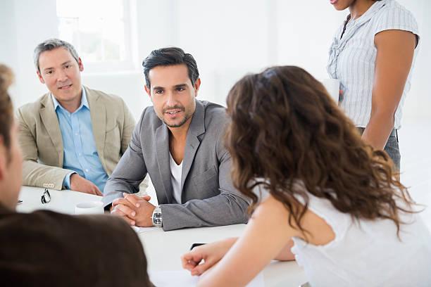 istock Businessman Discussing With Colleagues 186617391