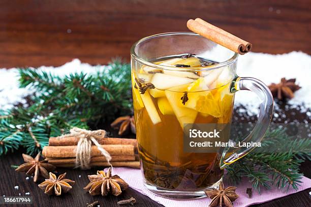 Spicy Tea With Apple And Orange Cinnamon Star Anise Christmas Stock Photo - Download Image Now