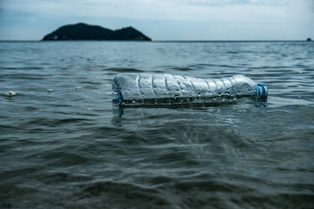 istock Plastic bottle waste floating on sea water. 1866196427