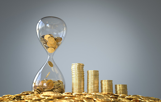 Gold coin in the hourglass, Time is money concept. 3D illustration