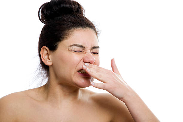 young woman big sneeze stock photo