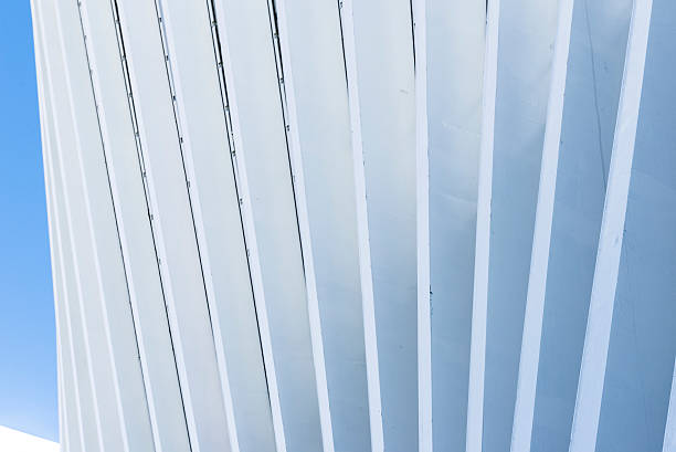 istock Abstract White Architecture Building on Clear Blue Sky 186621694