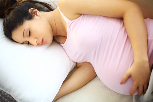 istock Sleeping pregnant woman. 186621892
