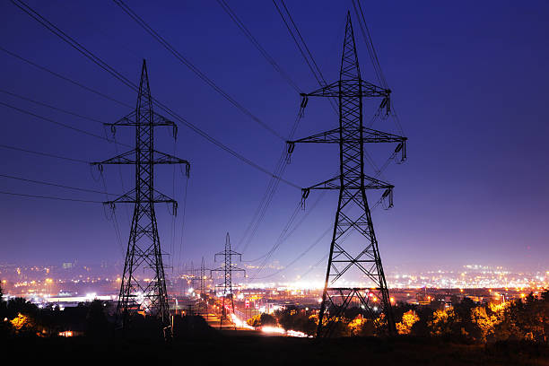 Electricity Pylons in Illuminated Quebec City stock photo