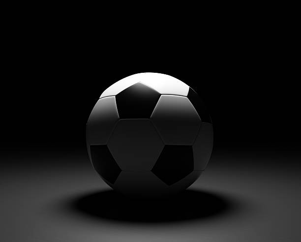 istock Black and white soccer ball 186622159