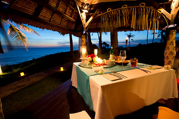 istock Romantic dinner by the sea at sunset 186622318