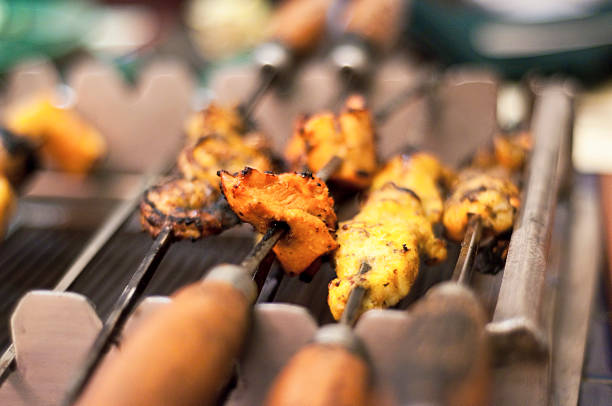 istock Close-up of chicken on barbeque grill 186629701