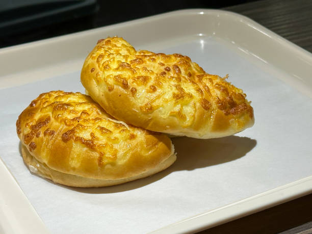istock Closeup cheese bread on white tray at the table 1866306134