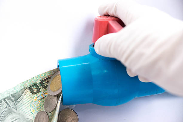 money,big  tap and the mysterious hand stock photo
