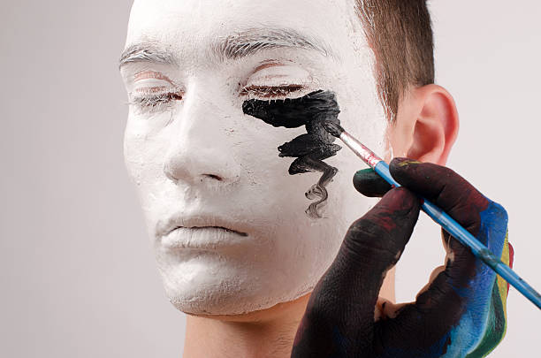 istock Beautiful young man painted on the face,Halloween 186632590