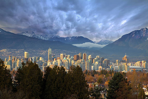 istock Vancouver BC City Skyline with Mountains 186635135