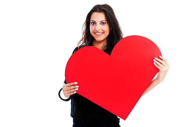 istock Young woman with red heart 186637045