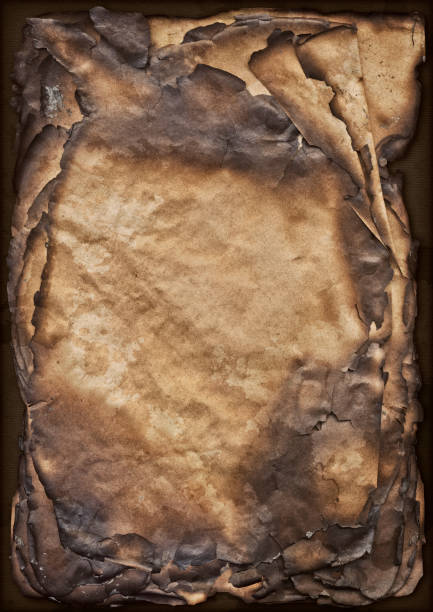 istock Burnt Pile of Brown Paper Sheets Vignette Grunge Texture 186638759