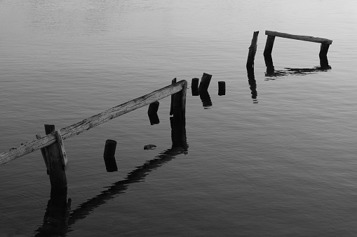The transience of things. The rotten remains of an old jetty. Lost place