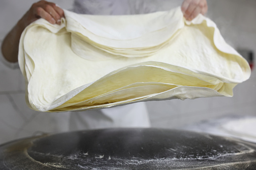 Rolling out phyllo bread-Phyllo bread