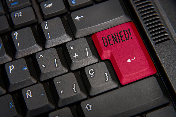 istock Black keyboard with red key and word denied 186652053