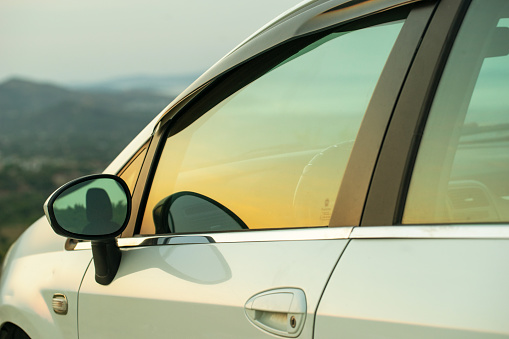 Saratov, Russia - August 11, 2015: Car Acura MDX is parked at the countryside at sunset