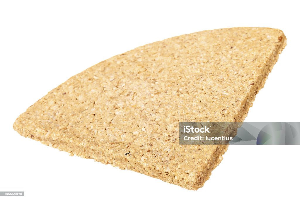 Scottish oatcake Traditional thick Scottish oatcake in the shape of a quadrant, isolated on white.. Baked Stock Photo