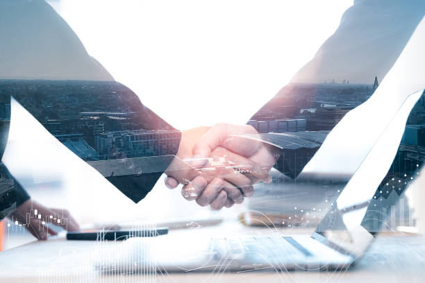 istock business man investor handshake with global network link connection digital technology, internet communication, teamwork, partnership concept. 1866556656