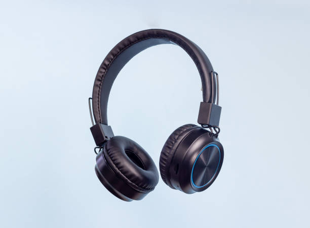 istock Black headphones on a blue background. Minimal concept. 1866586152