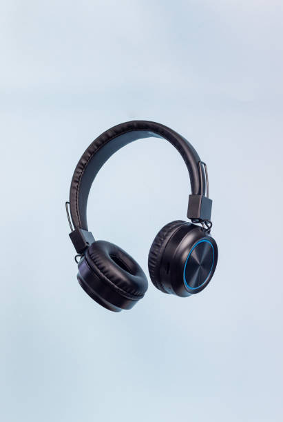 istock Black headphones on a blue background. Minimal concept. 1866586153