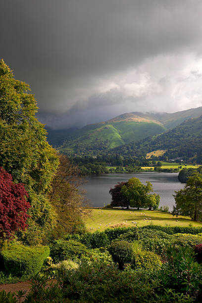 Grasmere Dramatic sky over Grasmere, the Lake District, Cumbria, England. grasmere stock pictures, royalty-free photos & images