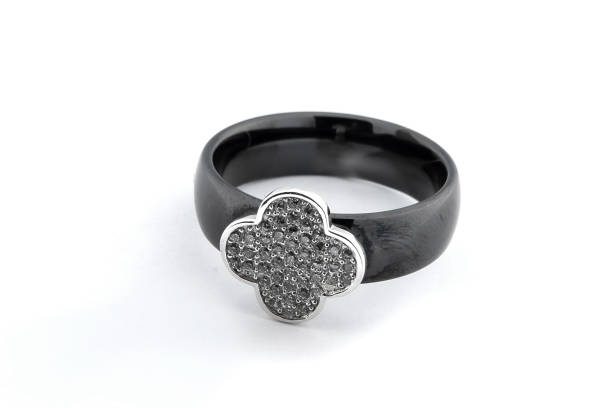 Oval diamond engagement ring with wedding ring bands for bride and groom