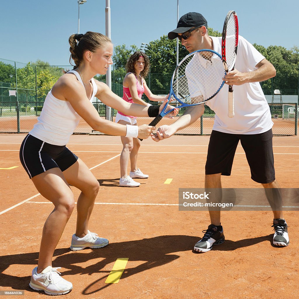 Lezioni di Tennis - Foto stock royalty-free di Imparare