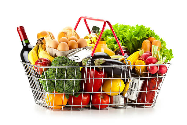 istock Shopping basket filled with food against white backdrop 186666554