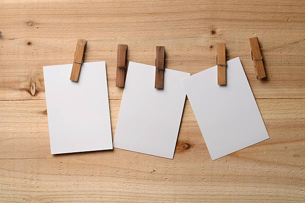 istock Blank instant photo prints on a washing line 186666737