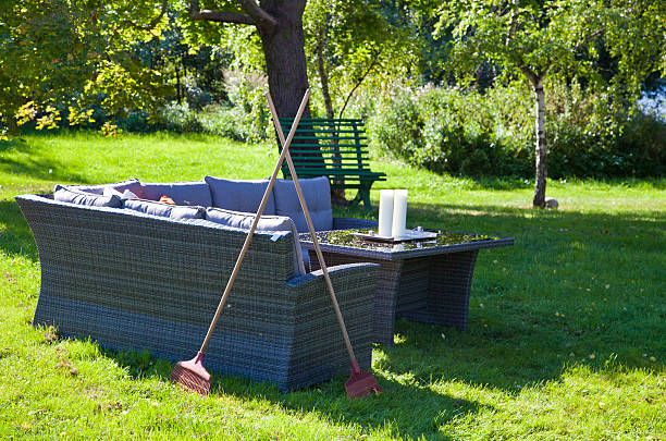 Garden furniture in a backyard garden in the summer