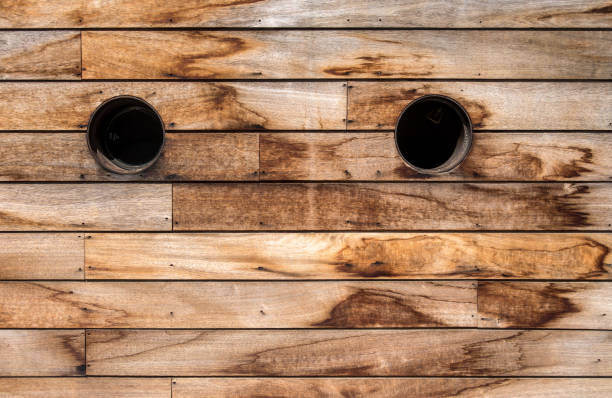 istock Brown wooden wall texture with portholes 1866682886